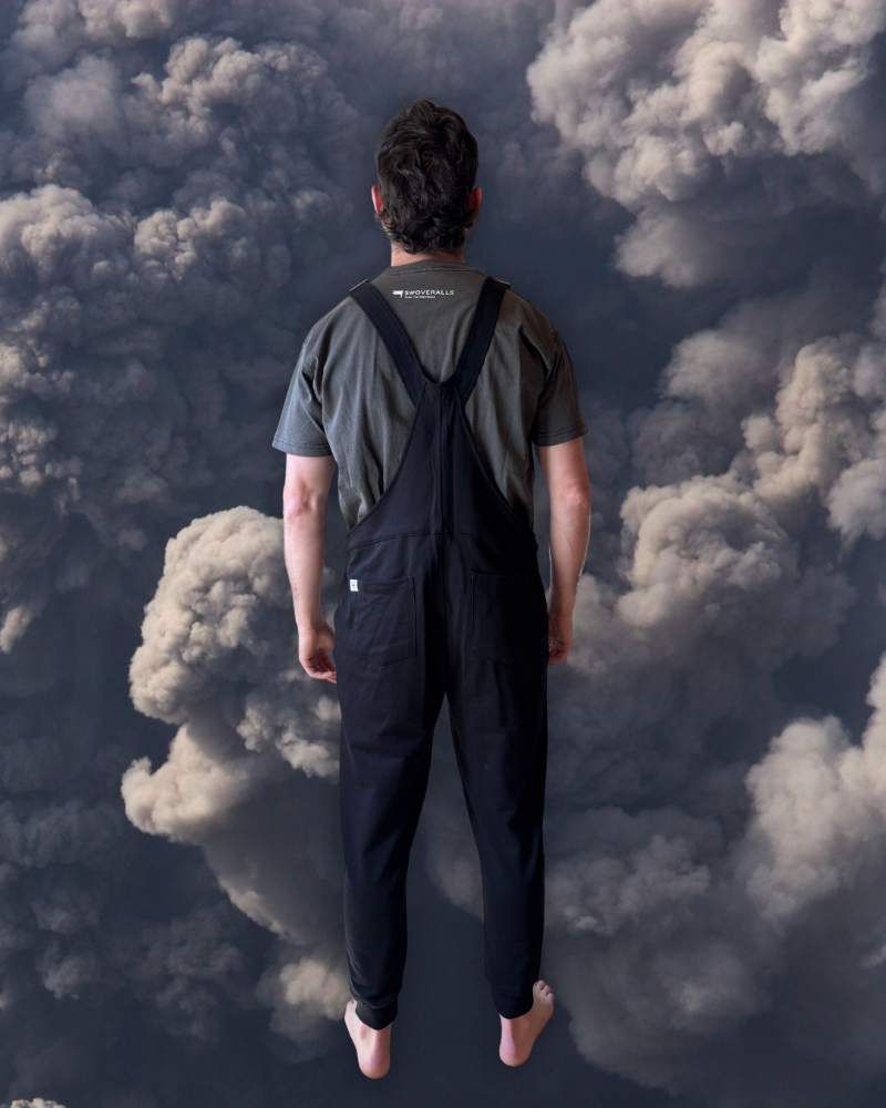 Close-up of a single green leaf against a white background.