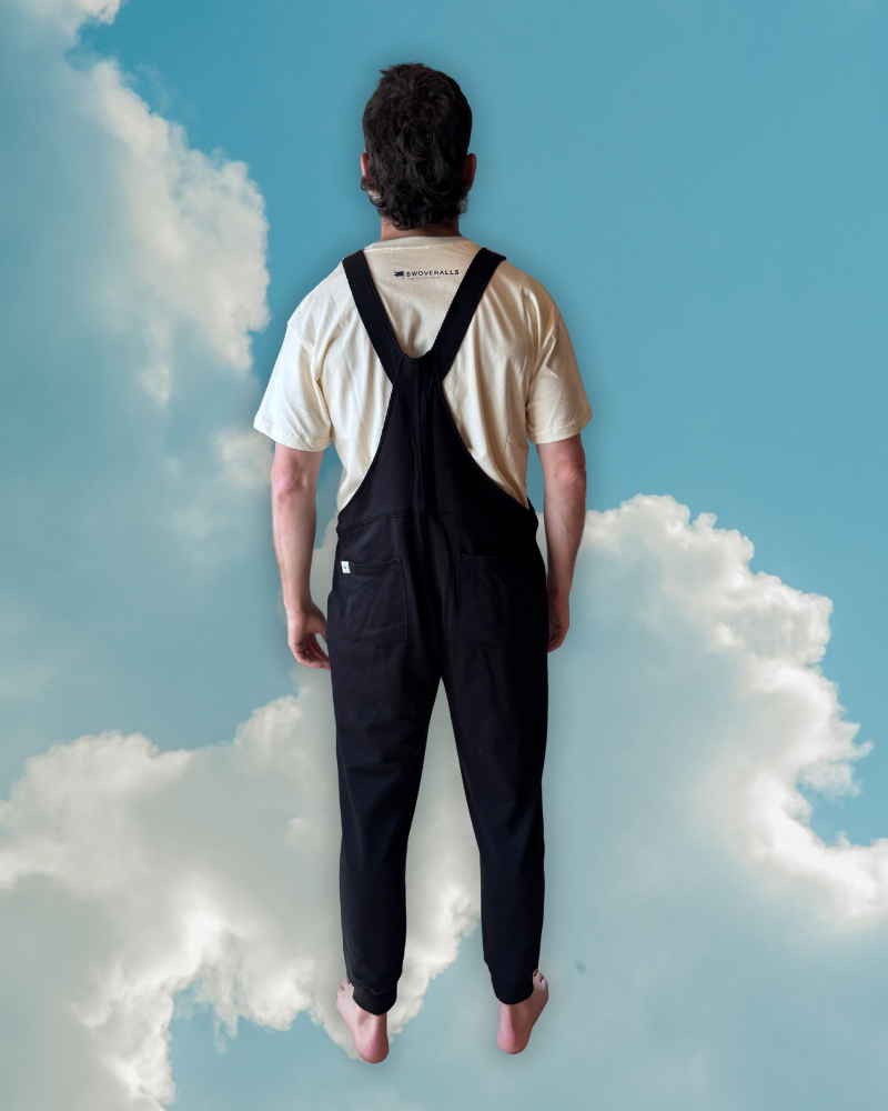 Close-up of a single green leaf against a white background.