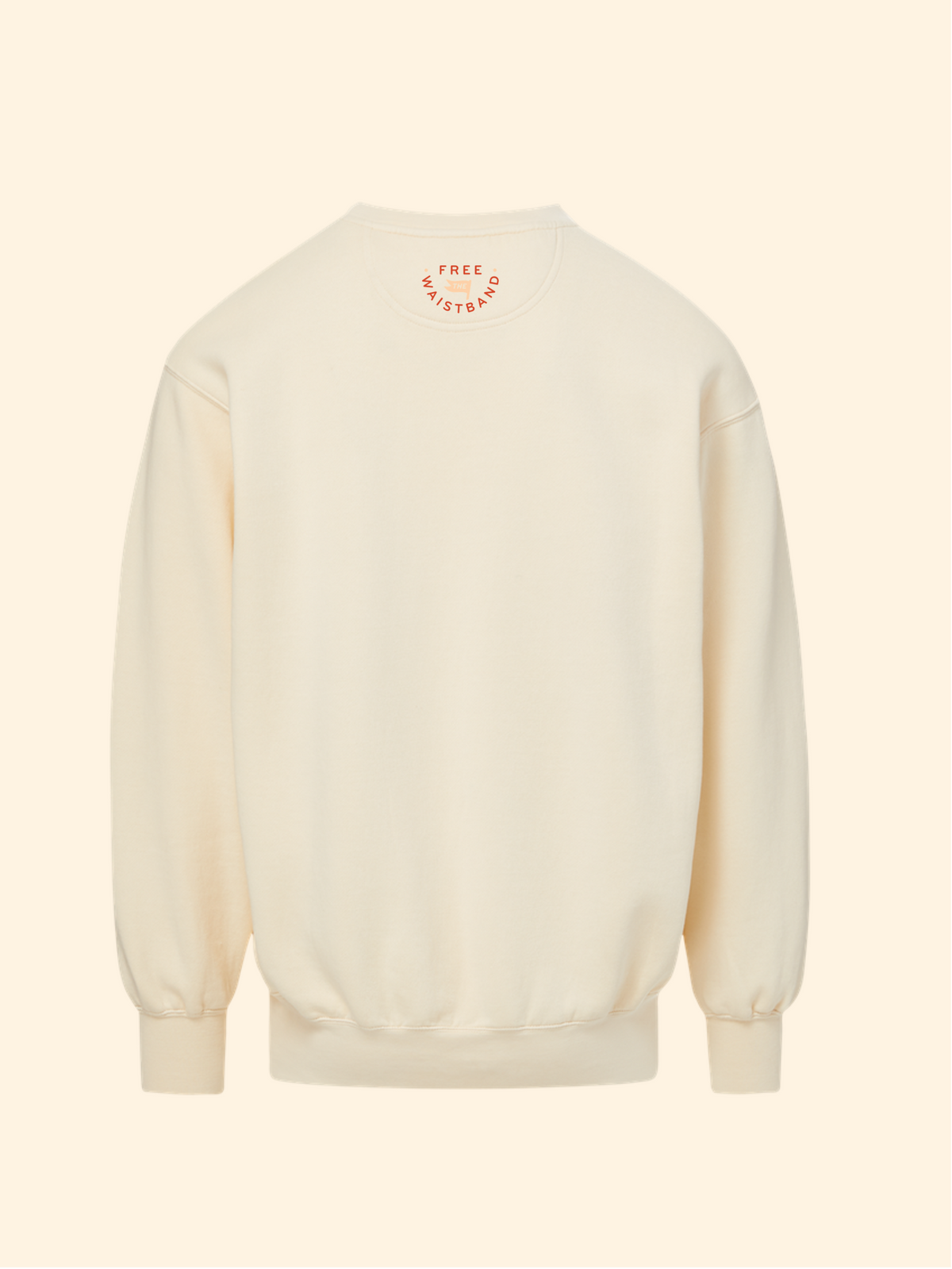 A cream-colored crewneck sweatshirt shown from the back, featuring a small circular graphic with the text 'FREE SKYTOPS' in orange around a central yellow sun motif.
