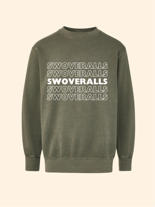 An olive green crewneck sweatshirt featuring the word 'SWOVERRALLS' repeated in white outline and solid block lettering across the chest, displayed on a solid cream background.