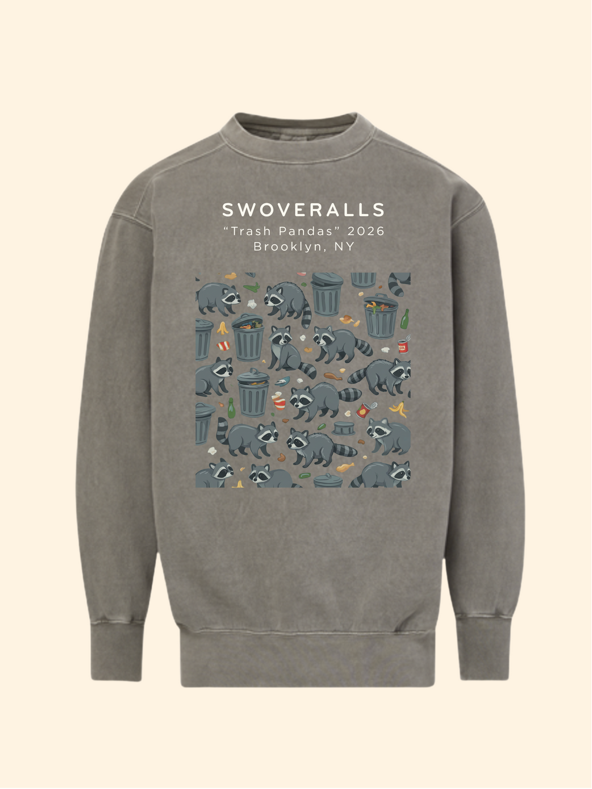 A gray crewneck sweatshirt featuring a graphic print of raccoons and trash cans with the text 'SWOVERALLS "Trash Pandas" 2026 Brooklyn, NY' on a light cream background.