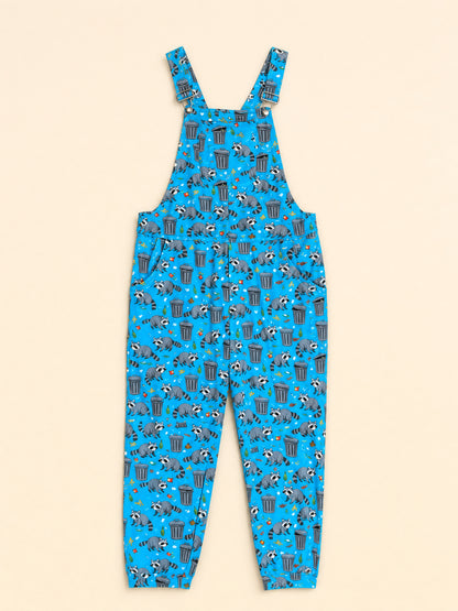 Bright blue overall jumpsuit with an all-over raccoon and trash can pattern, shown flat against a light beige background.
