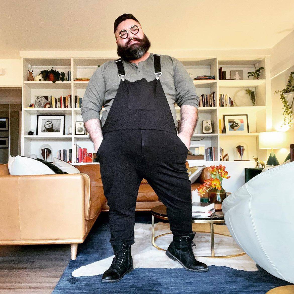 Ben Cuevas full length in Midnight Black Swoveralls with jogger cuffs over boots