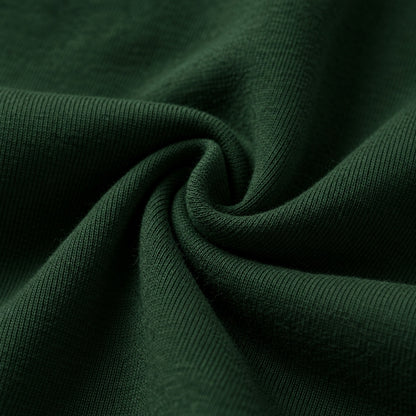Close-up of Swoveralls french terry fabric in forest green