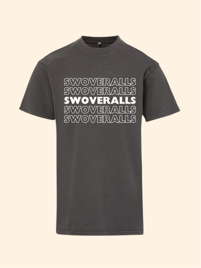A dark charcoal gray t-shirt with a graphic print on the front. The print features the text 'SWOVERALLS Trash Pandas 2026 Brooklyn, NY' above a pattern of raccoons in a trash can with small colorful details.